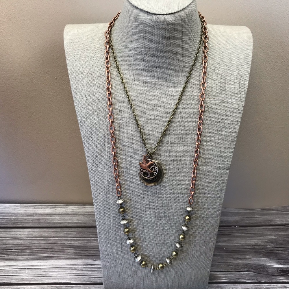 Mixed metal double strand cross necklace